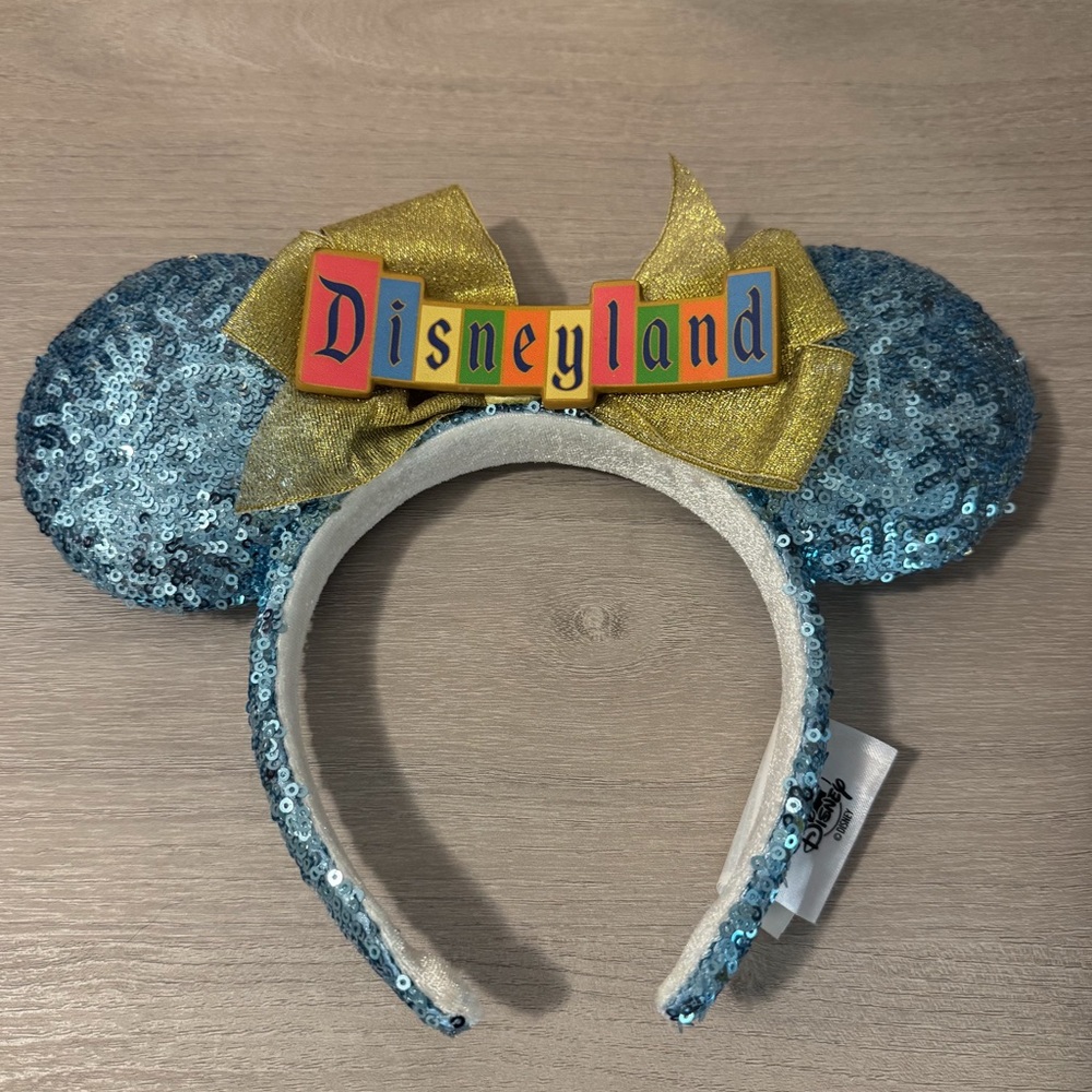 Disney Light Blue Sequin Minnie Ear Headband with Gold Bow